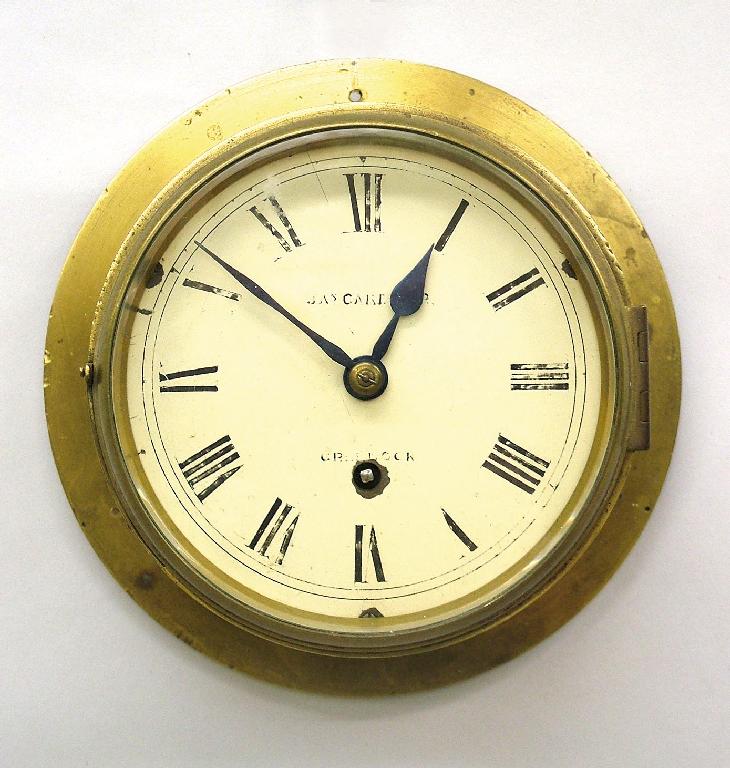 Appraisal: English single fusee brass bulkhead wall clock the movement with