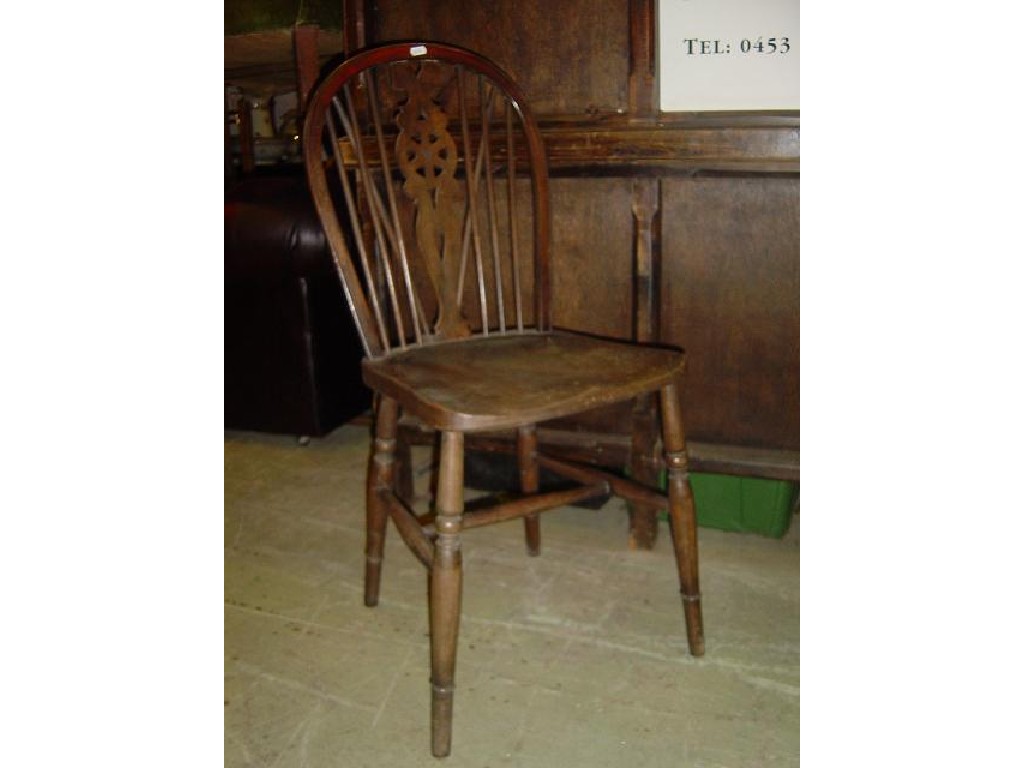 Appraisal: A Harlequin set of th century wheel back kitchen chairs