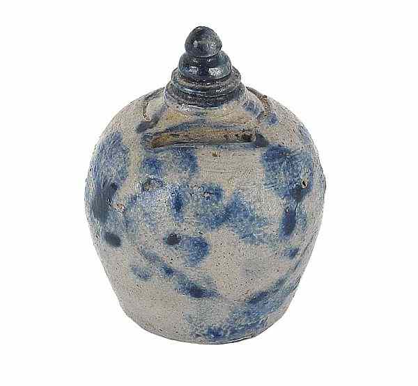 Appraisal: Pennsylvania or Maryland stoneware bank th c with cobalt floral