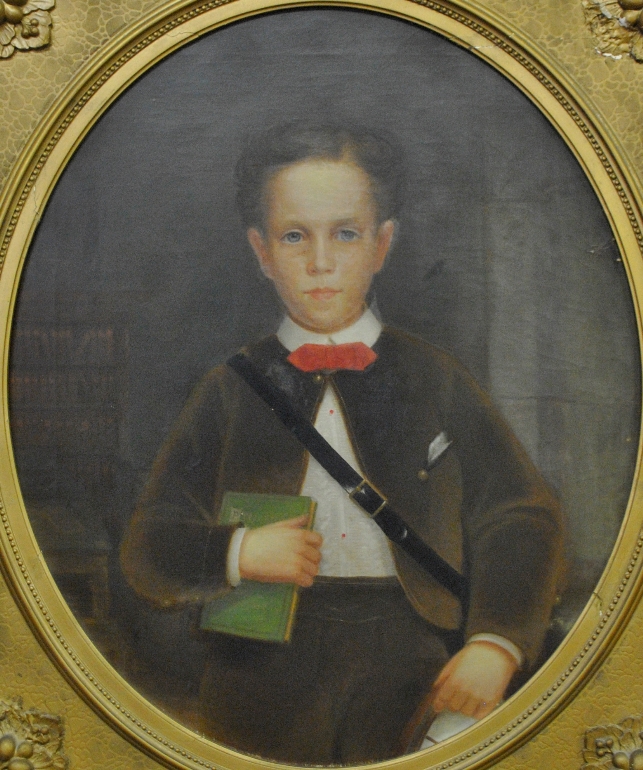 Appraisal: - Oil on canvas oval portrait of a young boy