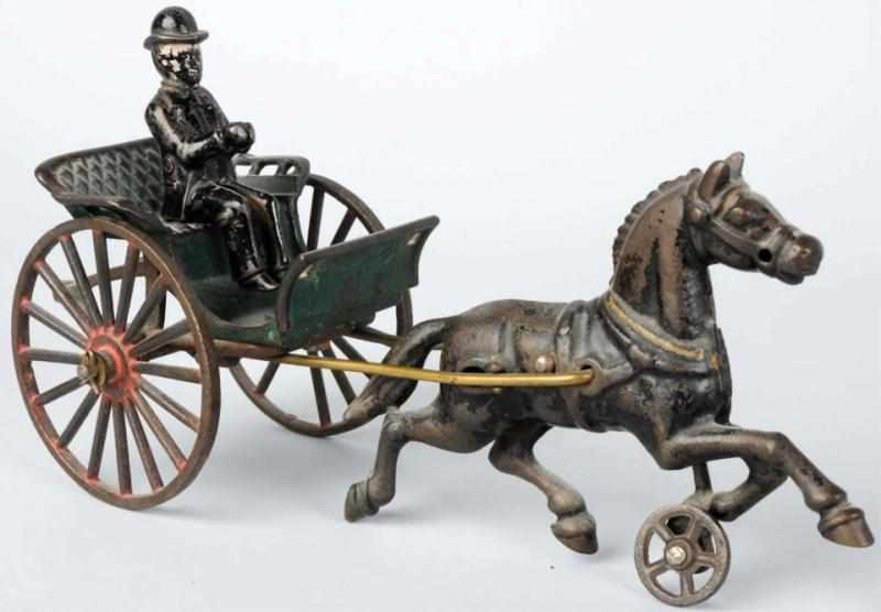 Appraisal: Cast Iron Horse-Drawn Cart Toy American Pulled by one horse