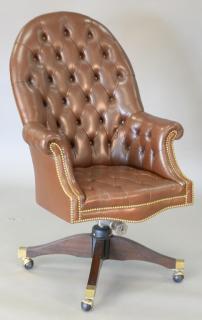 Appraisal: Executive swivel office chair with brown tufted leather total ht