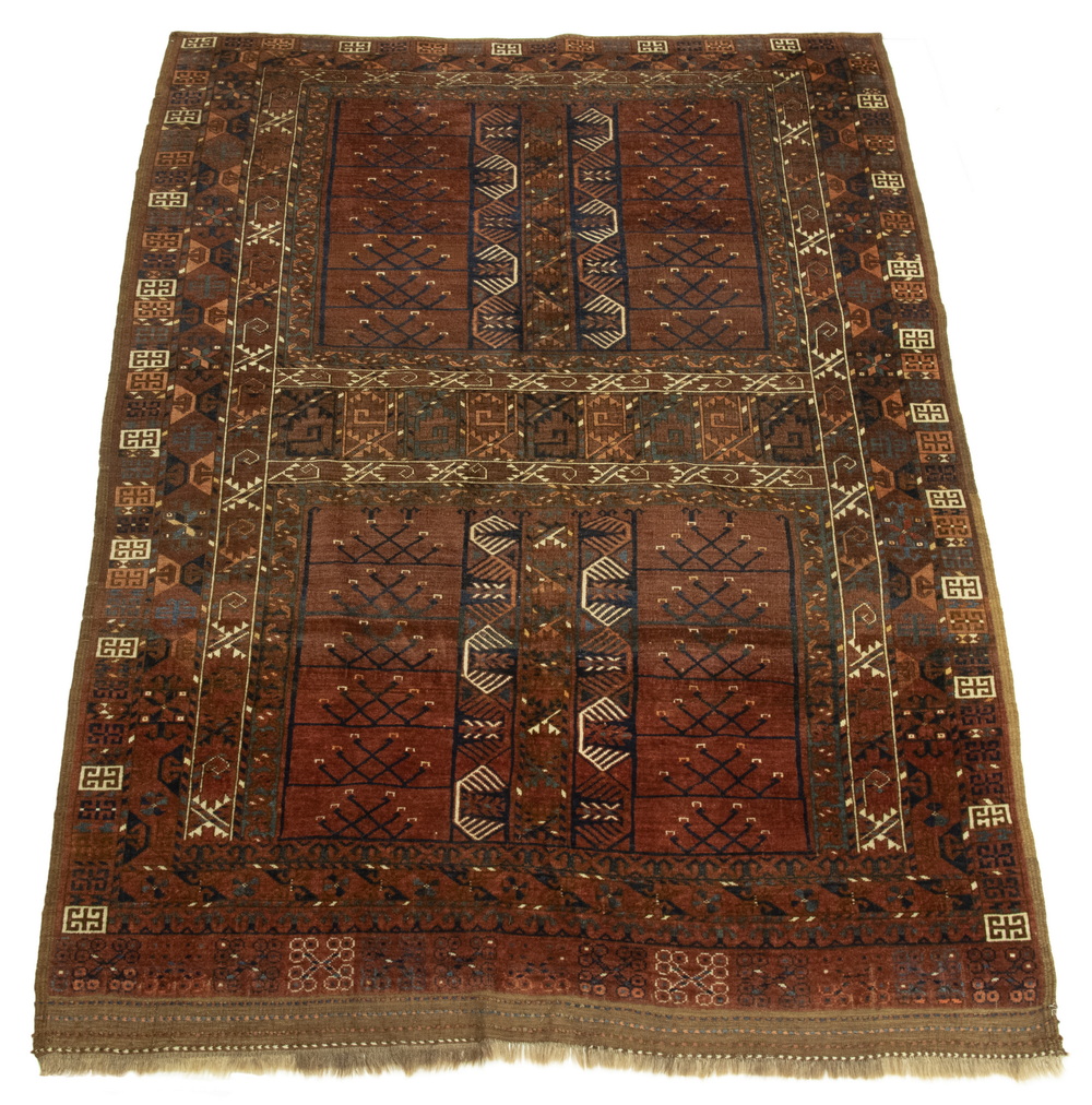 Appraisal: ERSARI TURKOMAN ENSI SMALL CARPET Dark red mahogany ground covered