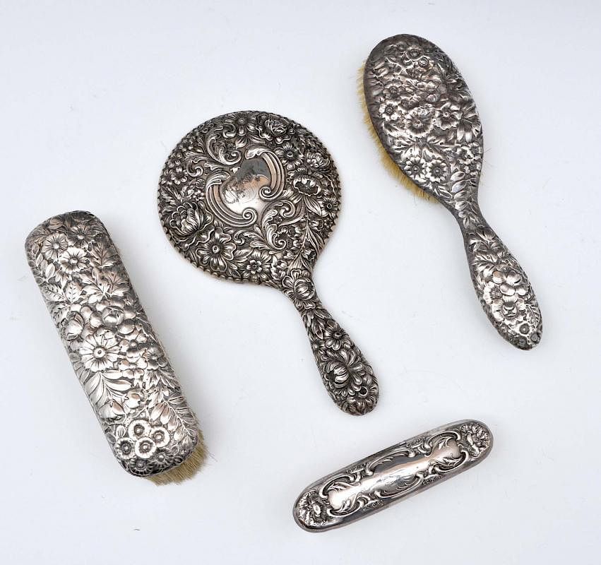 Appraisal: Assembled sterling silver floral repousse vanity set Assembled sterling silver