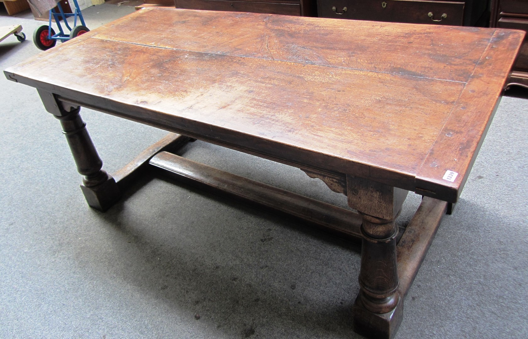 Appraisal: A th century style oak plank top refectory table on