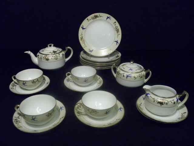 Appraisal: Noritake Japanese porcelain tea set Gilt decorated with hand painted