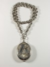 Appraisal: LOCKET ON CHAIN - Large oval sterling Victorian locket with