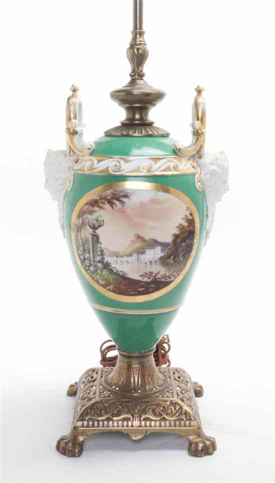 Appraisal: A Paris Porcelain Vase modeled with Bacchic mask handles and