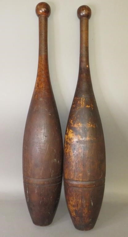 Appraisal: LARGE PAIR OF TURNED MAPLE INDIAN CLUBSca - each approximately