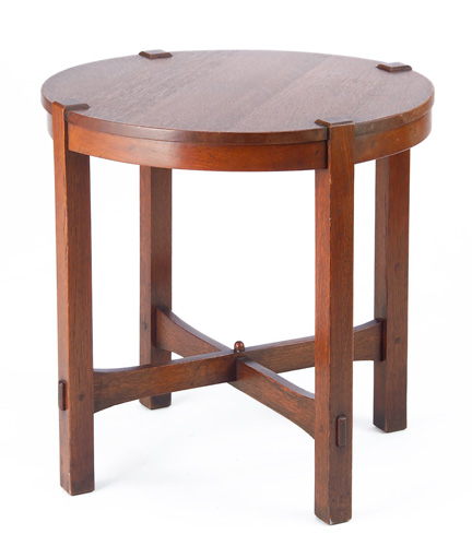 Appraisal: GUSTAV STICKLEY Rare circular lamp table with trumpeted cross-stretchers and