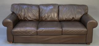 Appraisal: Brown leather sofa with three cushions Brown leather sofa with