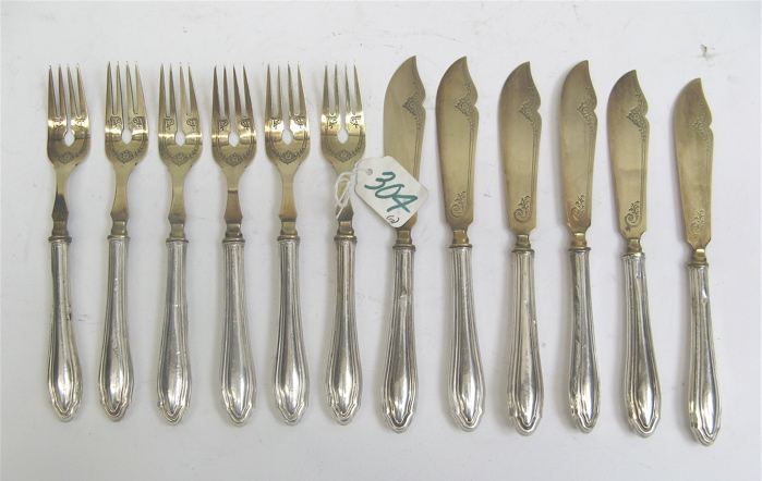 Appraisal: GERMAN FINE SILVER PARCEL GILT FISH SET pieces including engraved