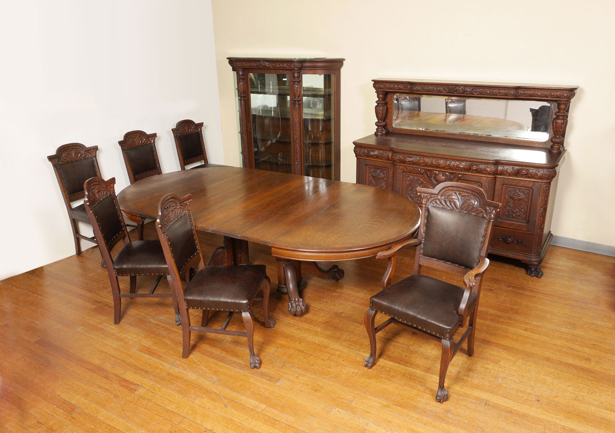 Appraisal: HASTINGS CARVED TIGER OAK PIECE DINING ROOM SET American th