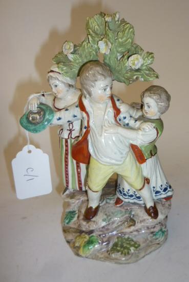 Appraisal: A PEARLWARE FIGURE GROUP early th century The Contest modelled