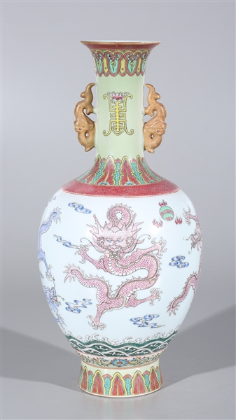 Appraisal: Chinese porcelain vase with applied modeled handles featuring dragons in