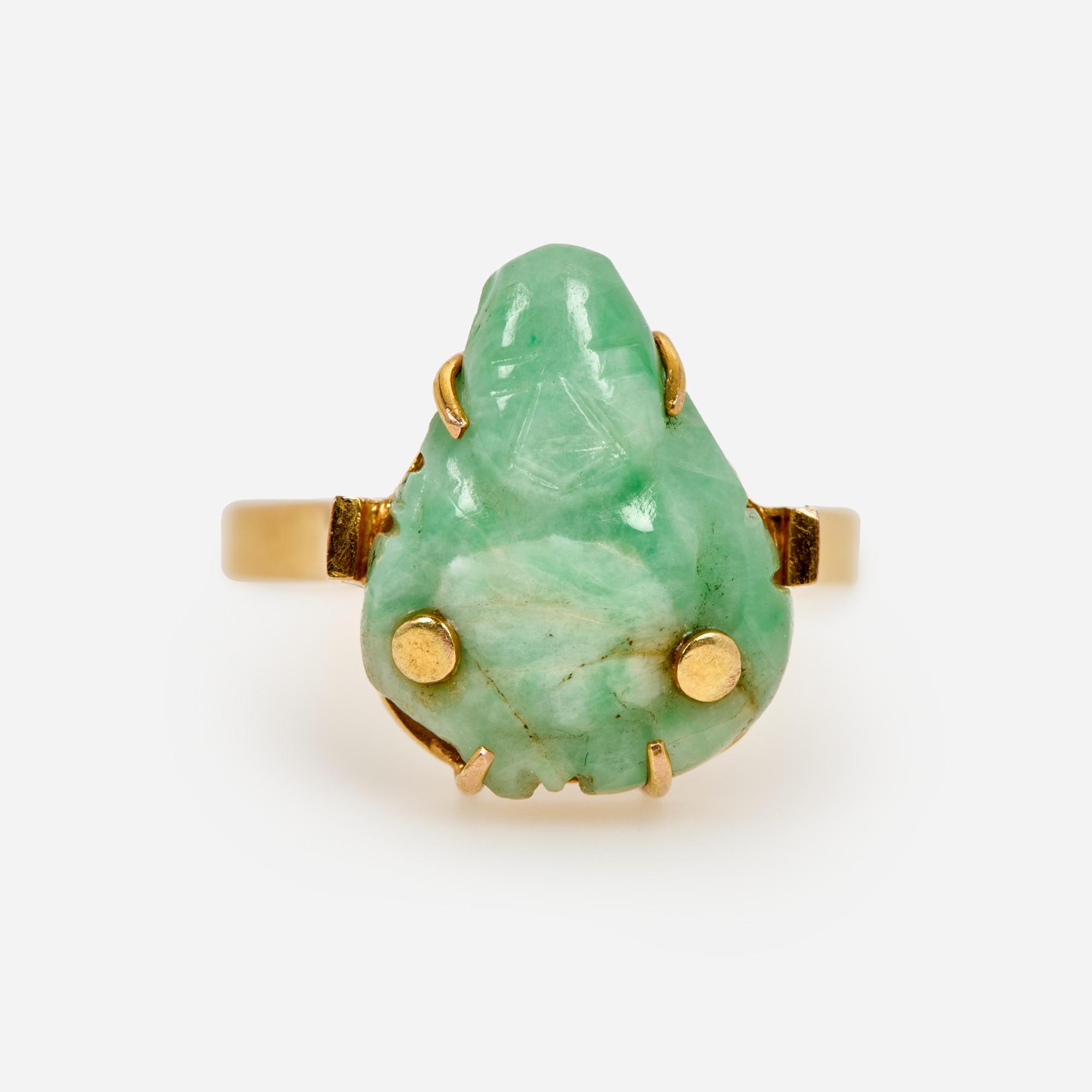 Appraisal: CARVED JADEITE JADE FIGURE RING IN K SIZE A k