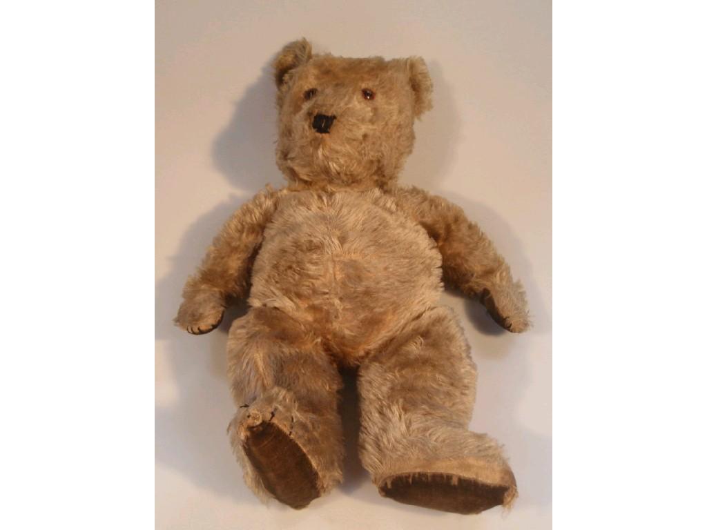 Appraisal: An English 's teddy bear possibly Chiltern with golden plush