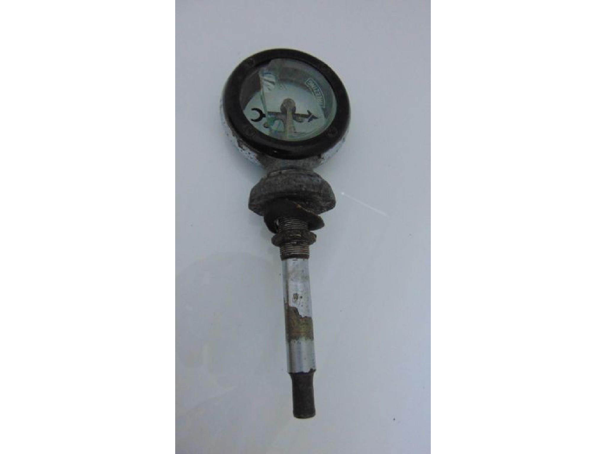 Appraisal: A vintage car radiator temperature indicator with original packaging