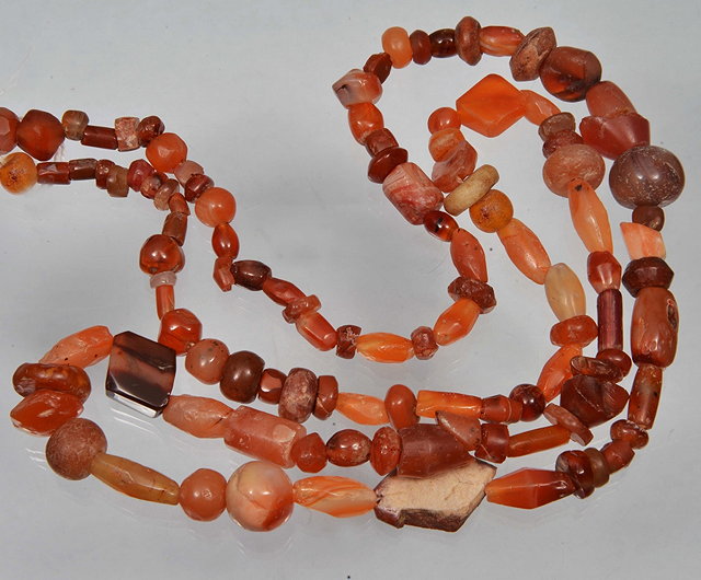 Appraisal: A CORNELIAN AGATE AND STONE BEAD NECKLACE long