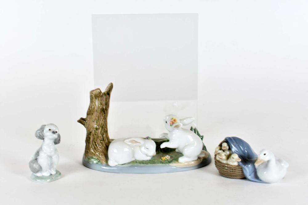 Appraisal: LLADRO PORCELAIN PHOTOGRAPH FRAMETogether with a figure of a goose