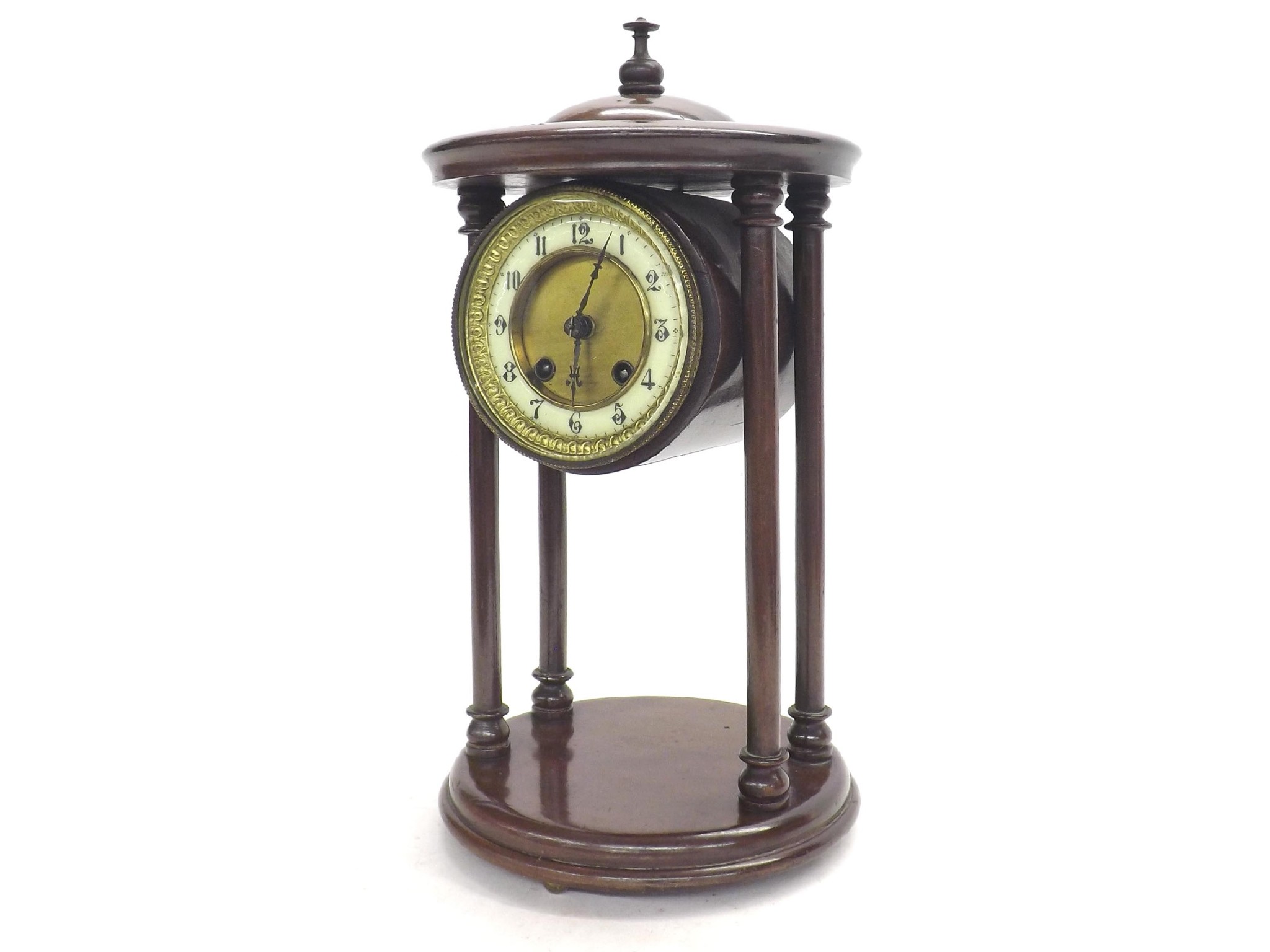 Appraisal: Mahogany drumhead portico two train mantel clock striking on a