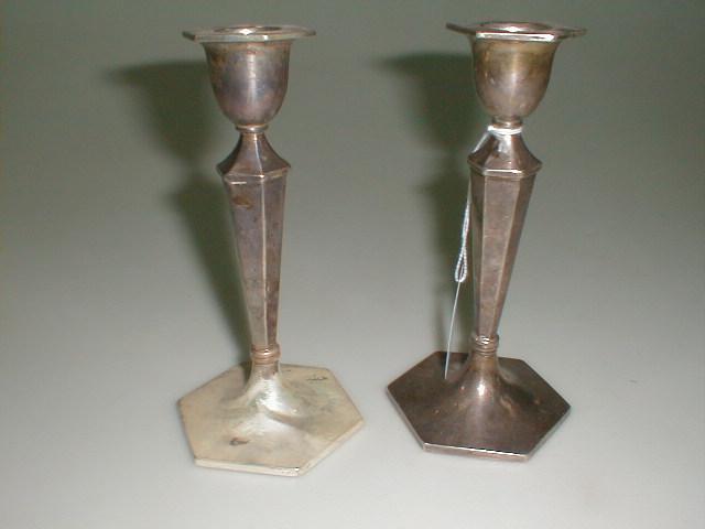 Appraisal: A pair of Walker Hall silver candlesticks Sheffield assay