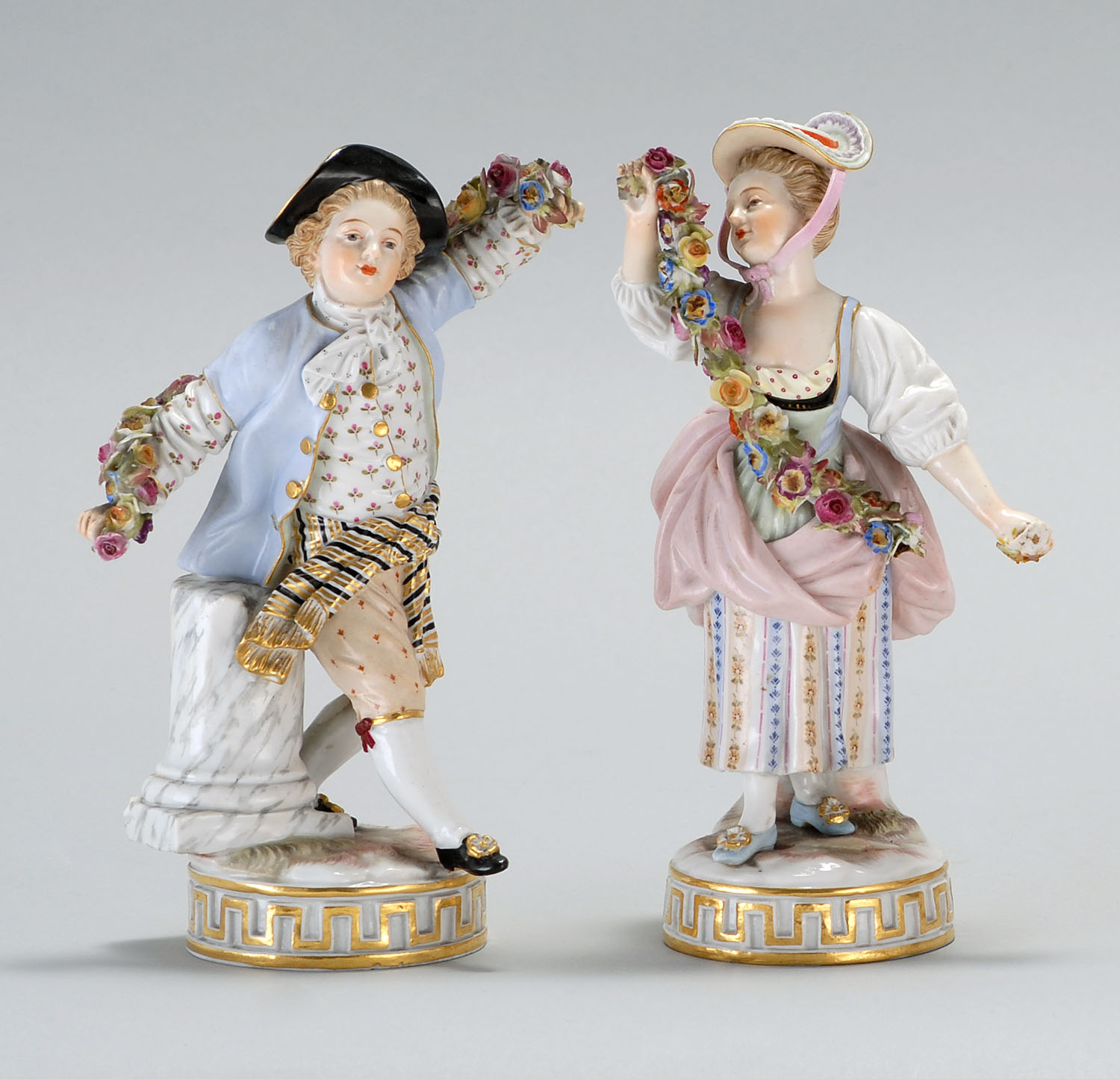 Appraisal: PAIR OF MEISSEN PORCELAIN FIGURES th CenturyA young man and