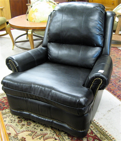 Appraisal: BLACK LEATHER RECLINING SWIVEL ROCKER Broadway Furniture Co