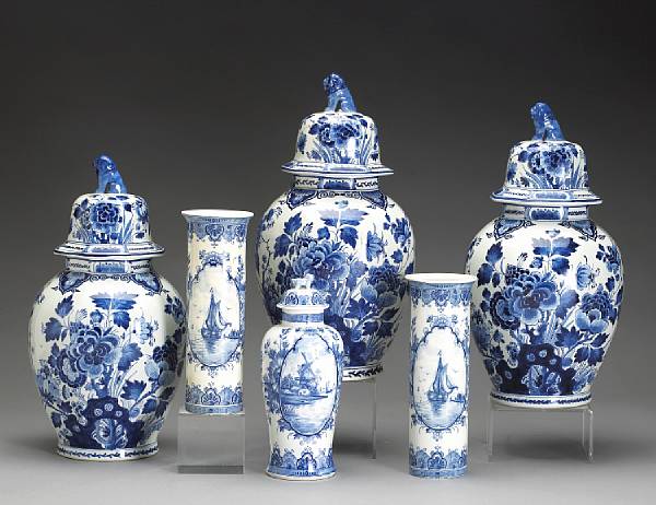 Appraisal: Three similar Dutch blue and white Delft vases and a