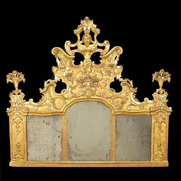 Appraisal: A Continental late Baroque giltwood overmantel mirror early th century