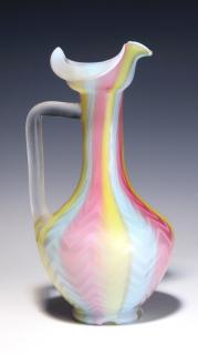 Appraisal: A TH C RAINBOW MOTHER-OF-PEARL ART GLASS EWER Good full