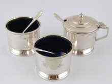 Appraisal: A three piece Art Deco silver cruet set with spoons