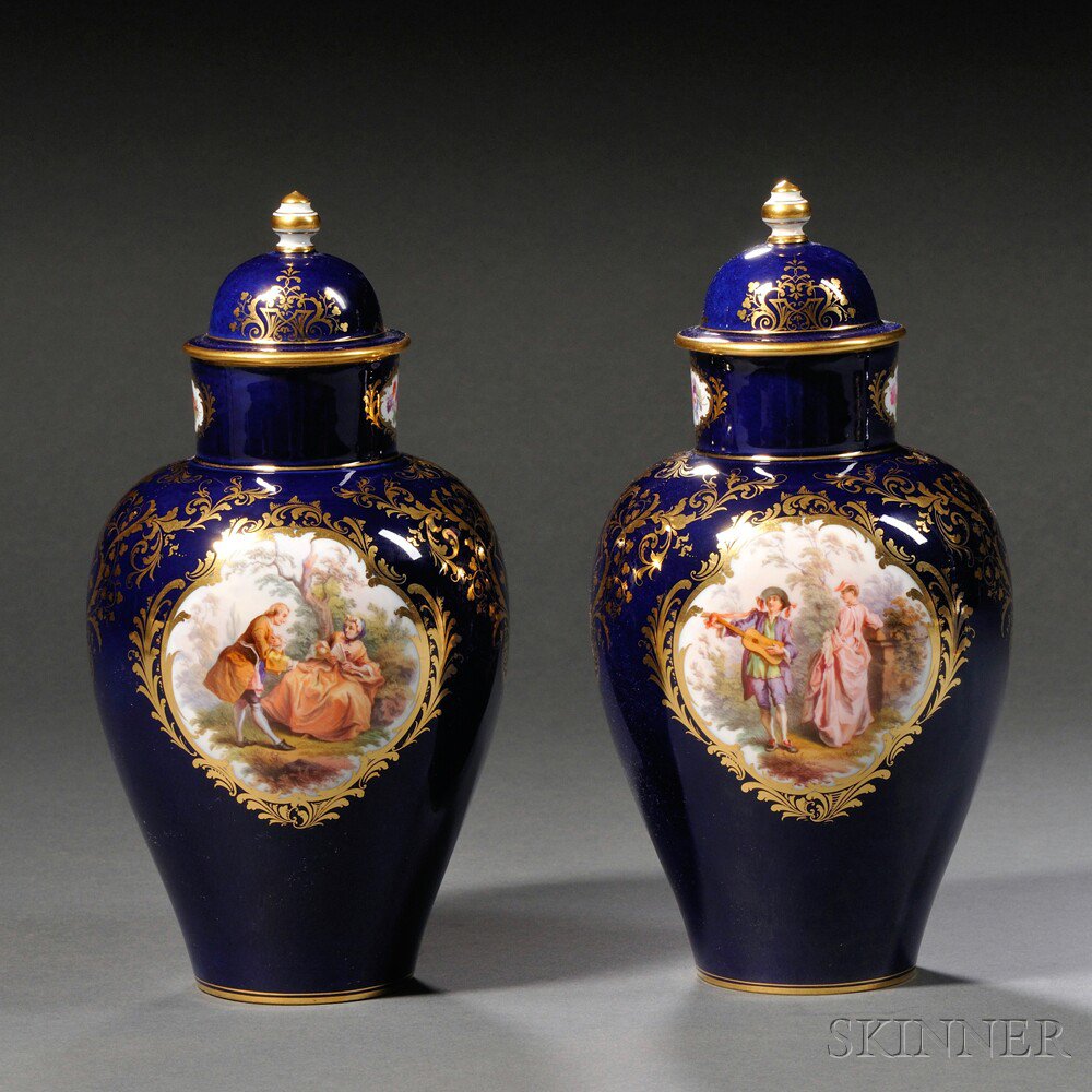 Appraisal: Pair of Meissen Porcelain Cobalt Blue Ground Vases and Covers