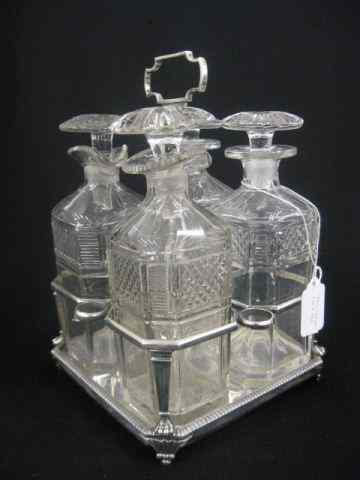 Appraisal: London Sterling Silver Cut CrystalDecanter Set bottles footed holder hallmarked