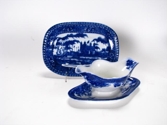 Appraisal: Ironstone Flow Blue England Platter x and Gravy Boat