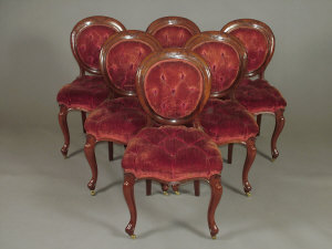 Appraisal: A set of six Victorian mahogany balloon backed dining chairs