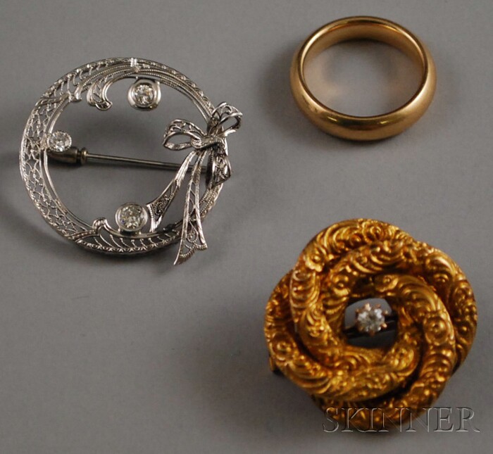 Appraisal: Two kt Gold and Diamond Brooches one yellow and one