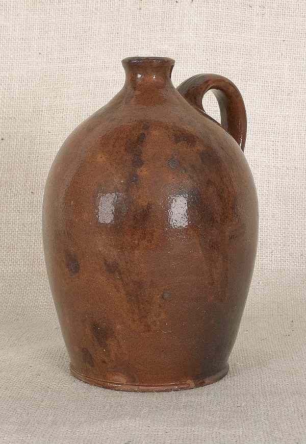 Appraisal: Pennsylvania redware jug th c with manganese splotching h