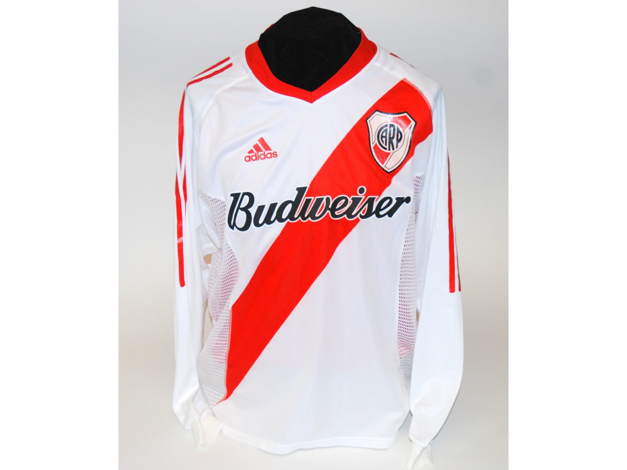 Appraisal: A red and white River Plate shirtNo with v-neck collar