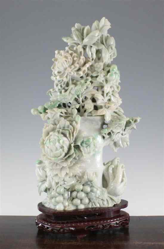 Appraisal: A large Chinese jadeite carving th century the milky white