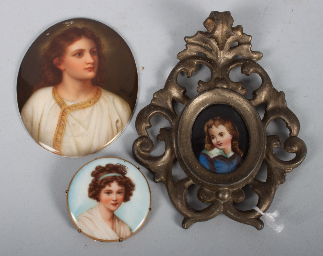 Appraisal: Three Continental painted porcelain plaques early th century Heubach portrait