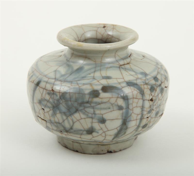 Appraisal: CHINESE BLUE AND WHITE CRACKLE-GLAZED LOW VASE The squat spherical