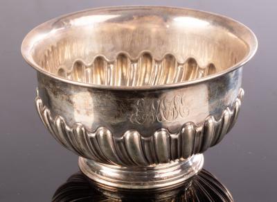 Appraisal: A small Victorian silver sugar bowl HH Sheffield of half-ribbed