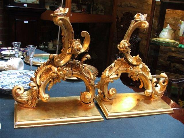 Appraisal: A PAIR OF ANTIQUE ROCOCO STYLE CARVED GILTWOOD WALL BRACKETS