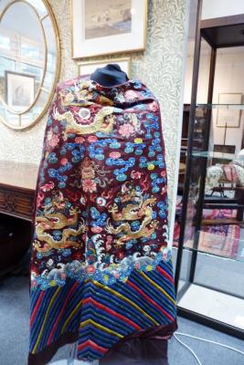 Appraisal: A Chinese uncut chestnut silk robe circa embroidered with nine