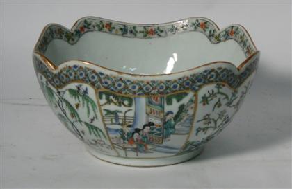 Appraisal: A Chinese export fruit bowlWith a scalloped edge banded rim