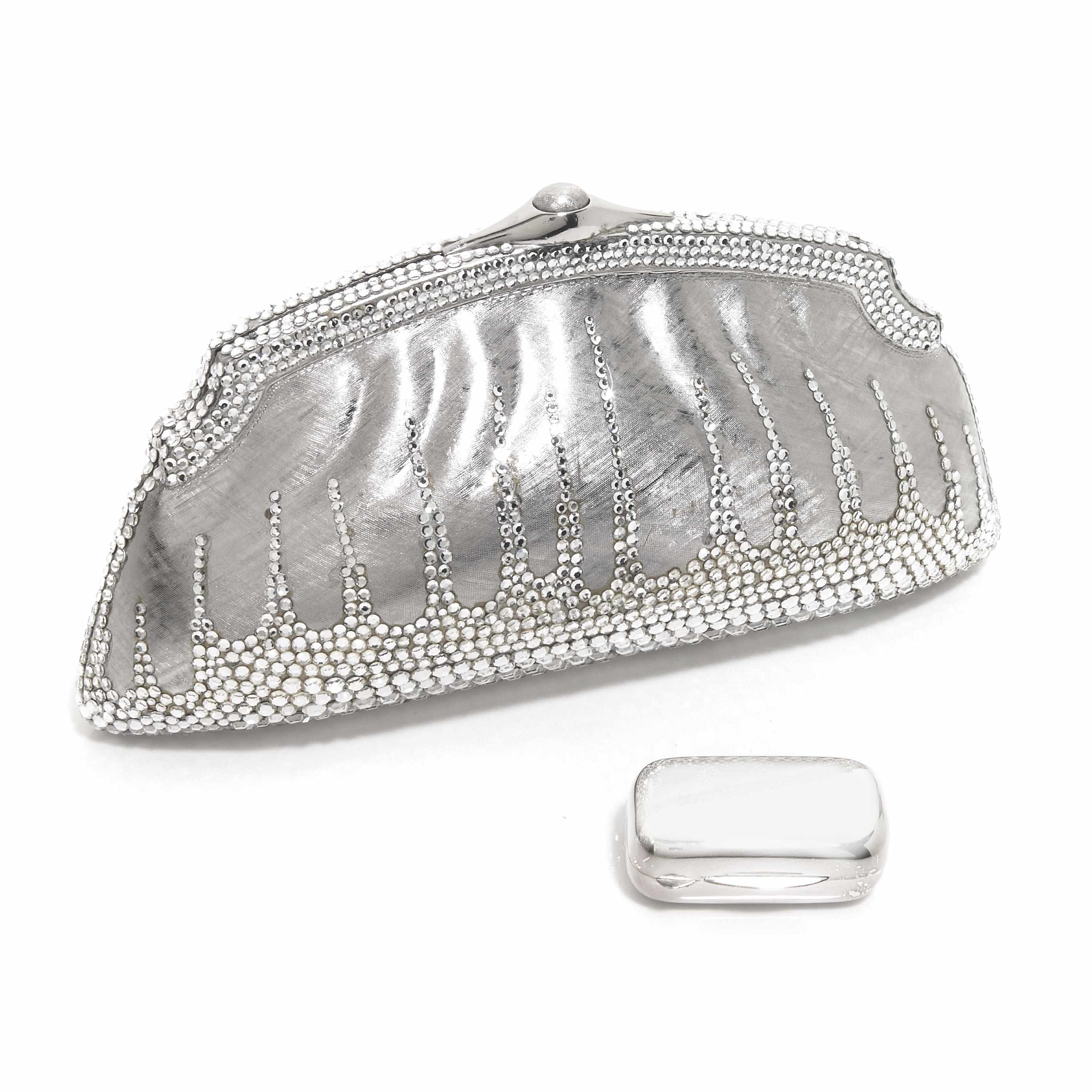 Appraisal: A silver crystal and brushed metal purse together with a