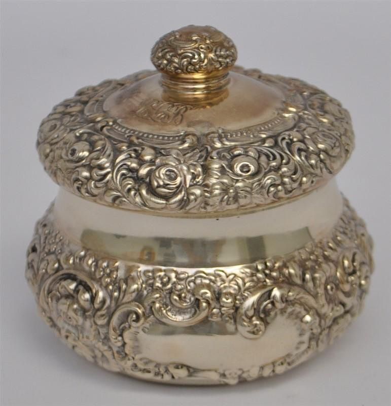 Appraisal: ORNATE STERLING SILVER REPOUSSE UNGER BROS VANITY JAR Ornate Sterling