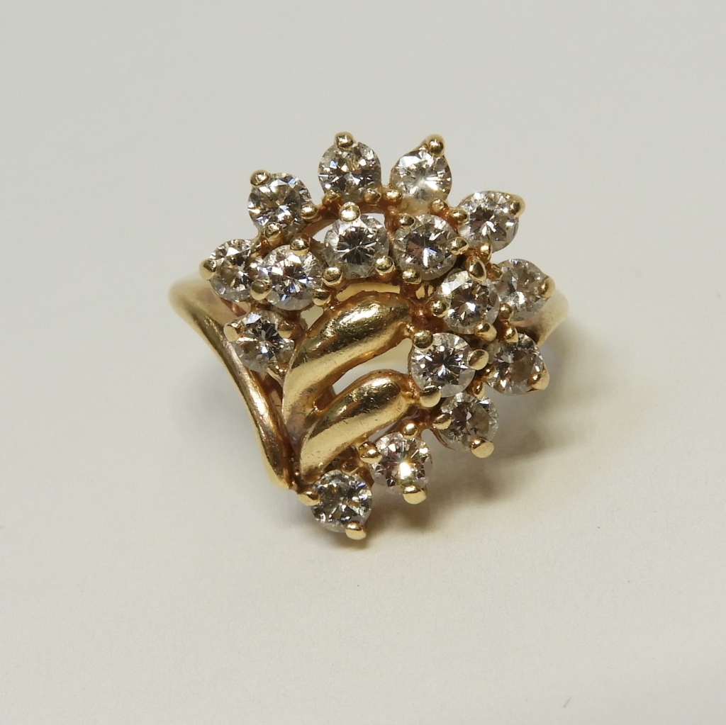 Appraisal: K YELLOW GOLD DIAMOND EVENING CLUSTER RING th CenturySixteen point