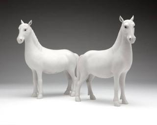 Appraisal: A pair of Chinese bisque porcelain horses th century each